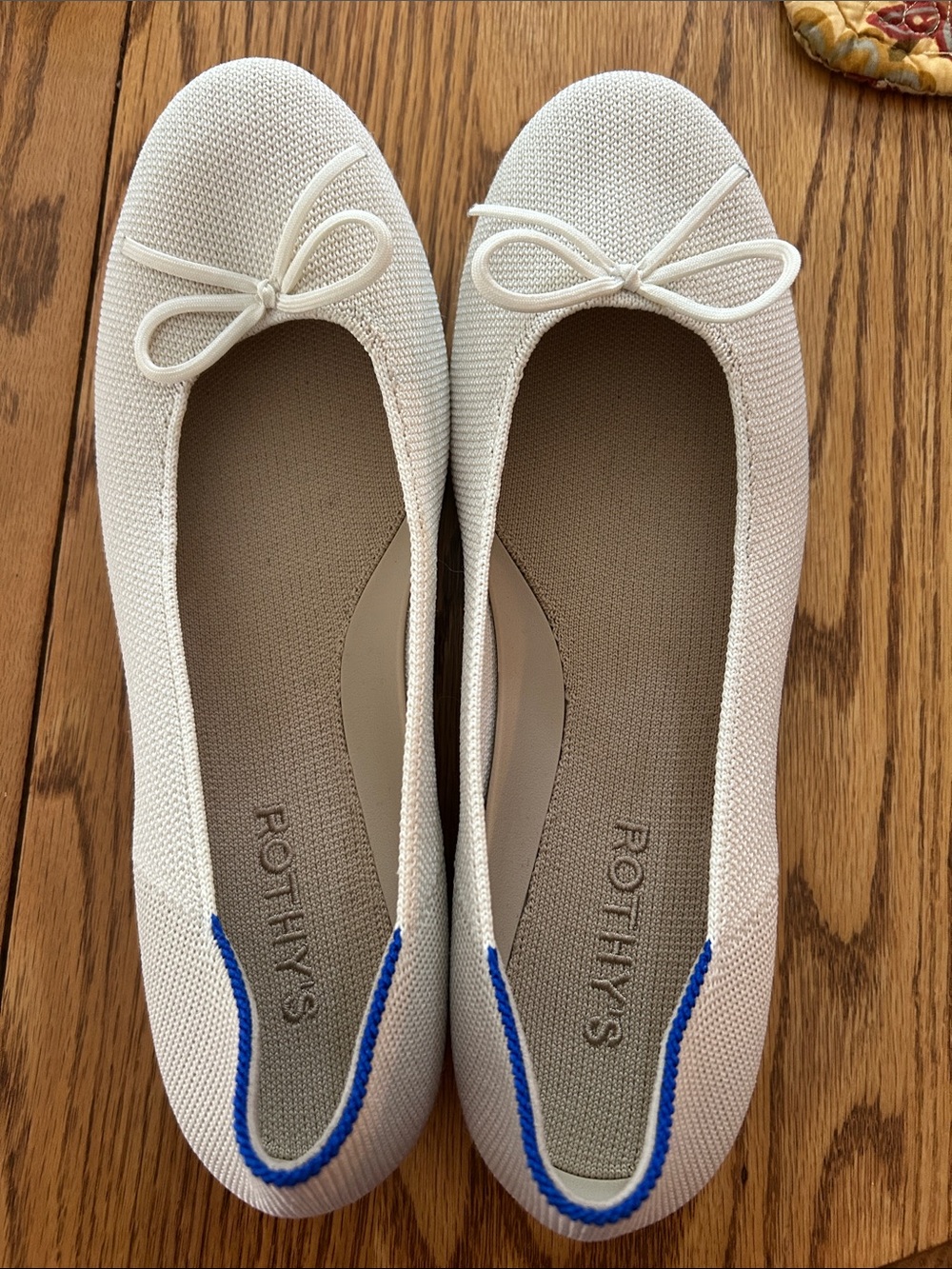 Rothy's Cream Knit Ballet Flats with Blue Heel Trim